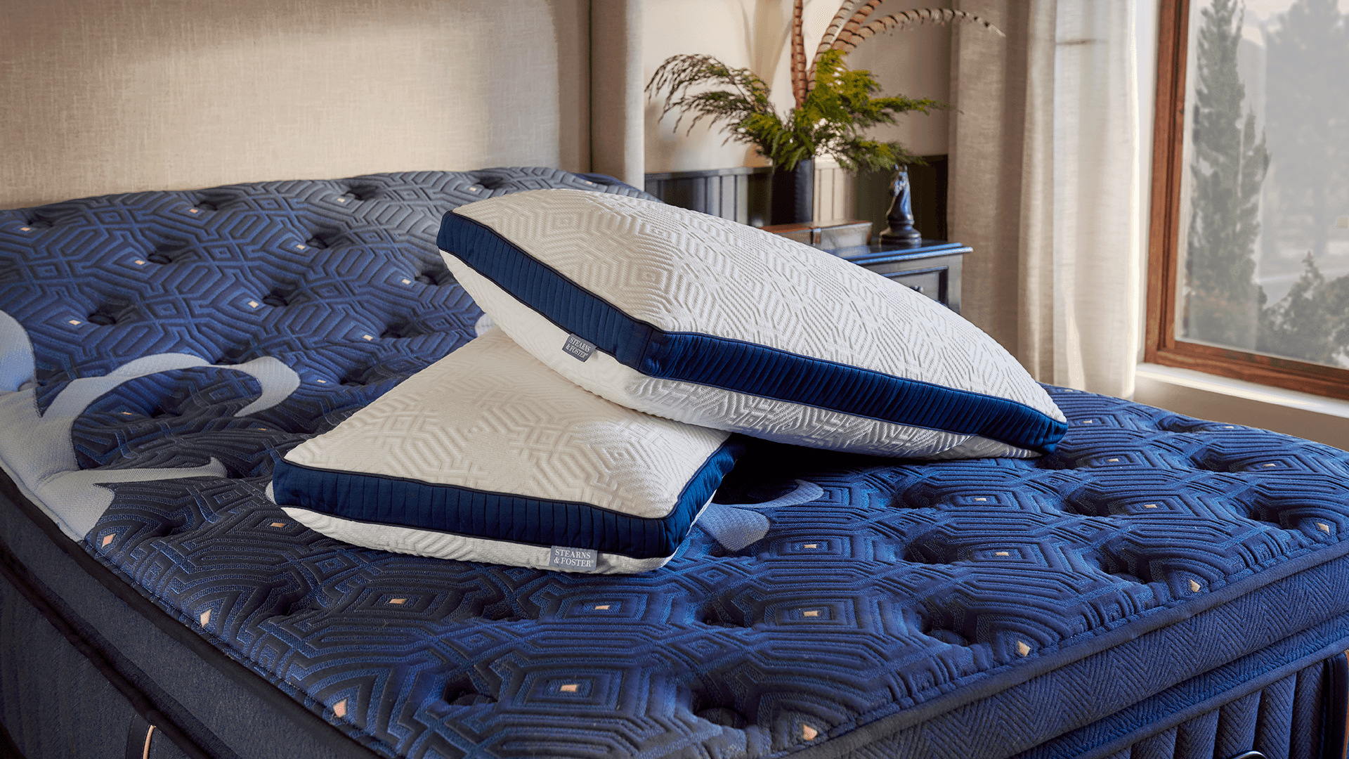 two Lux Estate pillow on a bare Stearns & Foster mattress