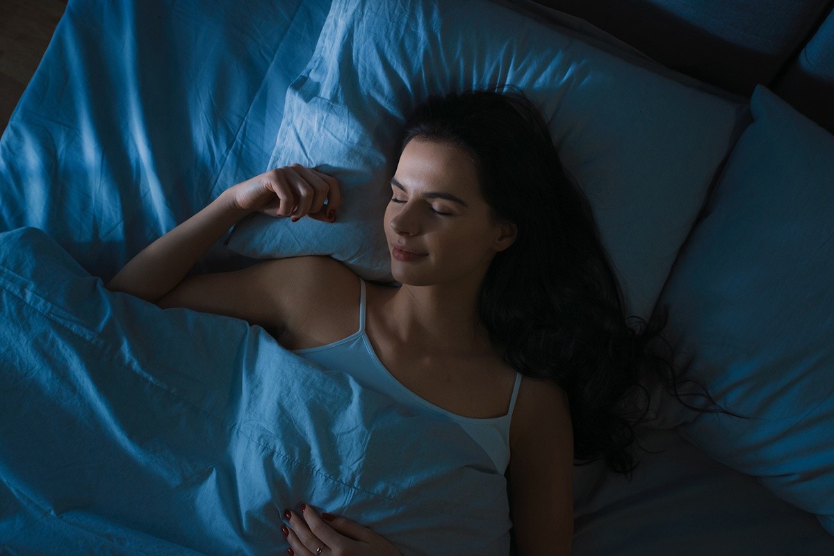 a close up of a woman sleeping